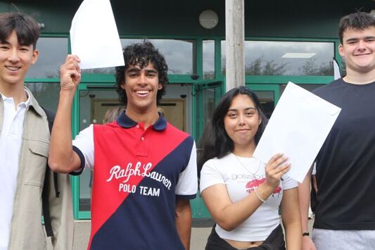 Students at Philip Morant School and College celebrating their GCSE results